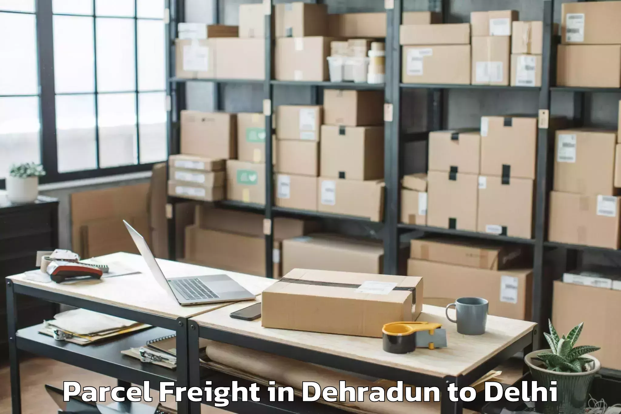 Easy Dehradun to Punjabi Bagh Parcel Freight Booking